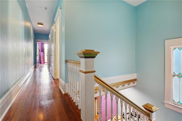 hallway featuring hardwood / wood-style floors