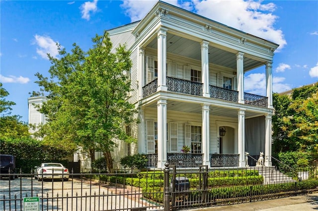 greek revival house with covered porch