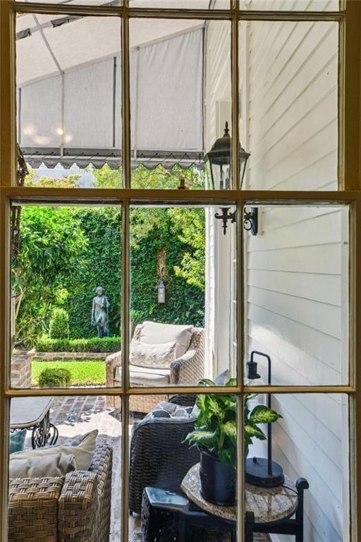 sunroom / solarium featuring plenty of natural light