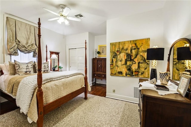 bedroom featuring wood-type flooring, a closet, and ceiling fan