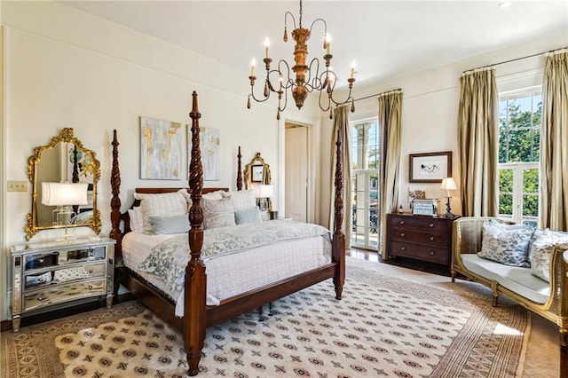 carpeted bedroom with a notable chandelier