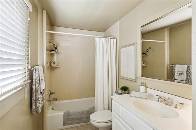 full bathroom with toilet, vanity, tile patterned floors, and shower / bath combo with shower curtain