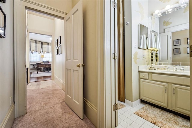 bathroom featuring tile patterned floors and vanity