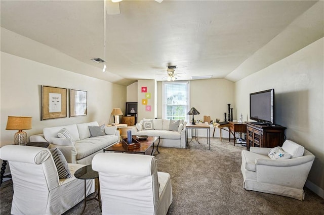 carpeted living room with ceiling fan and lofted ceiling