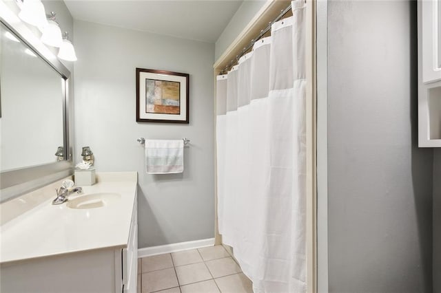 bathroom with vanity and tile patterned flooring