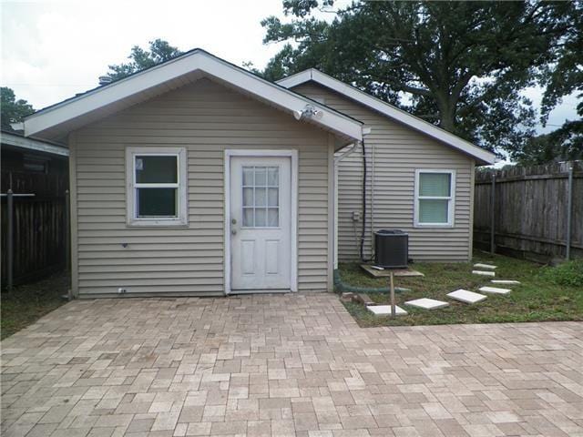 view of outbuilding featuring central AC unit