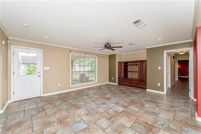 tiled foyer with ceiling fan and crown molding