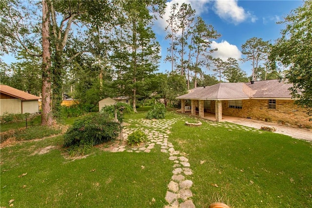 view of yard with a patio