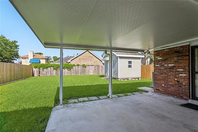 view of patio with a shed