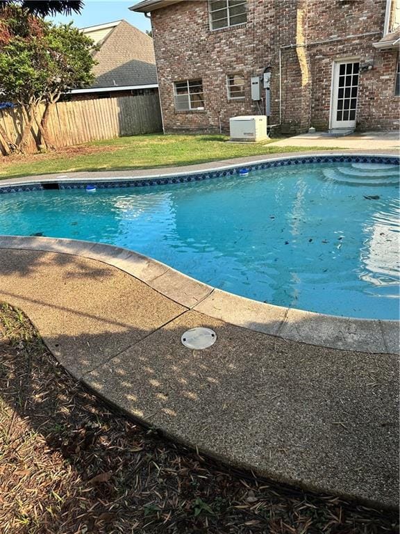 view of swimming pool with central AC