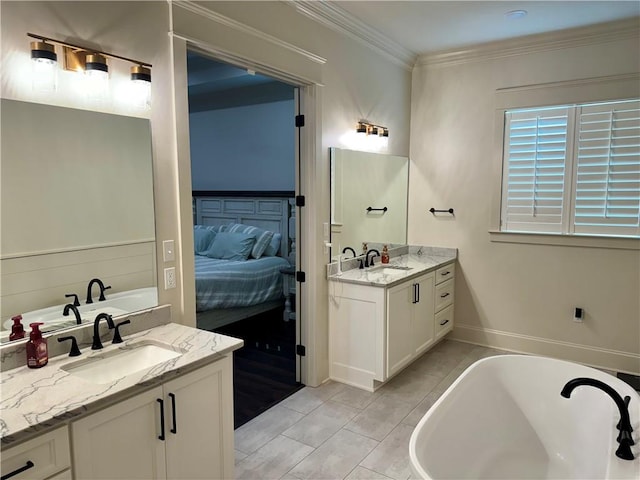 bathroom featuring tile patterned flooring, a bathing tub, crown molding, and dual bowl vanity