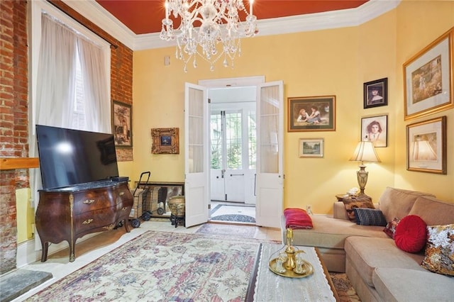 tiled living room with crown molding, brick wall, and a notable chandelier