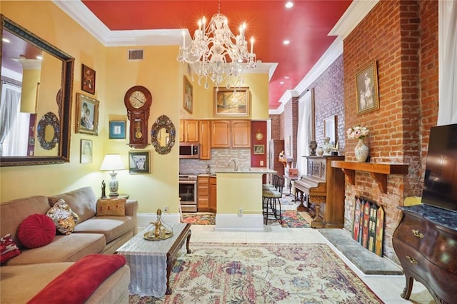 tiled living room with sink, a fireplace, an inviting chandelier, and ornamental molding