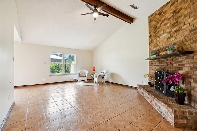 living room featuring light tile patterned flooring, vaulted ceiling with beams, a brick fireplace, ceiling fan, and brick wall