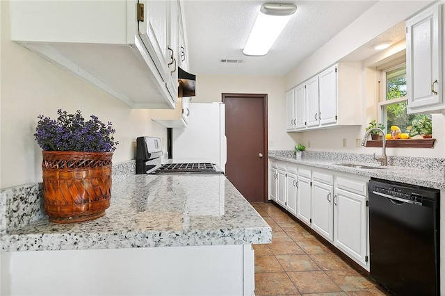 kitchen with light tile patterned flooring, black dishwasher, sink, range with gas stovetop, and white cabinets