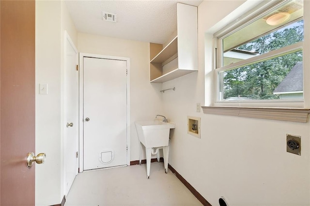 washroom featuring electric dryer hookup and hookup for a washing machine