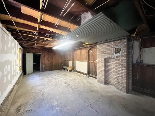 basement with wooden walls