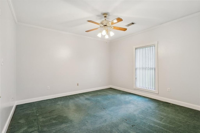 carpeted spare room featuring ceiling fan and crown molding