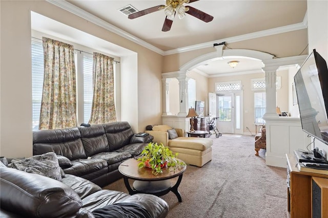 carpeted living room featuring ornate columns, ornamental molding, and ceiling fan