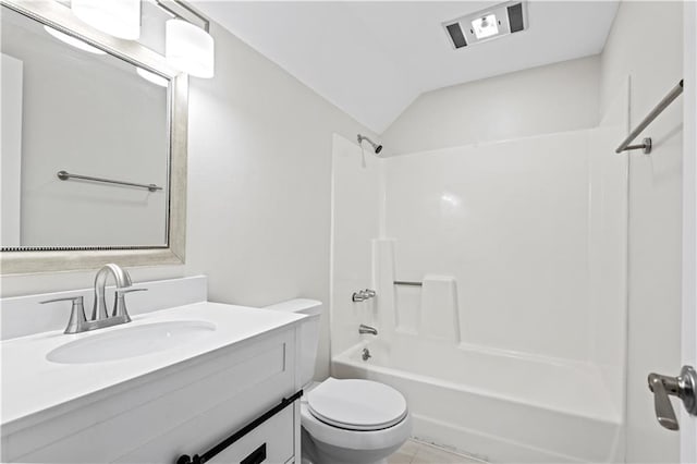 full bathroom featuring tile patterned floors, shower / bath combination, vanity, and toilet