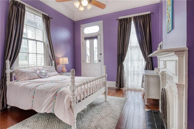 bedroom featuring ceiling fan and hardwood / wood-style floors