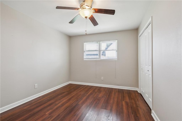 unfurnished bedroom with a closet, ceiling fan, and wood-type flooring