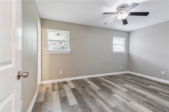 spare room featuring ceiling fan and hardwood / wood-style floors