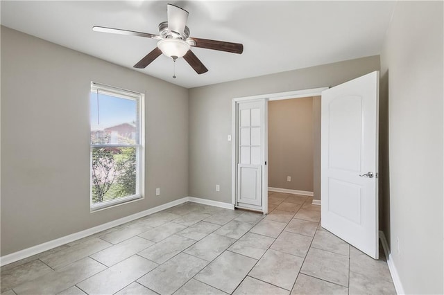 interior space featuring ceiling fan