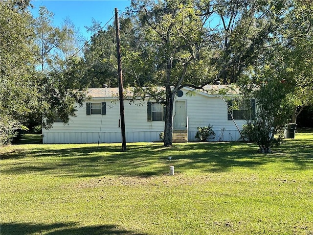 exterior space featuring a front lawn