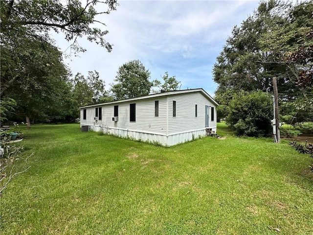 view of home's exterior featuring a lawn