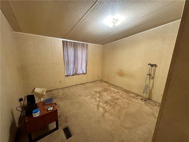 empty room with a textured ceiling