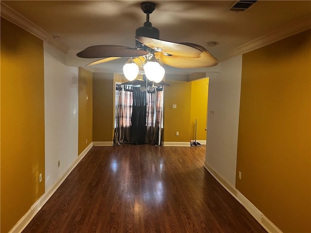 unfurnished room with ceiling fan, ornamental molding, and wood-type flooring