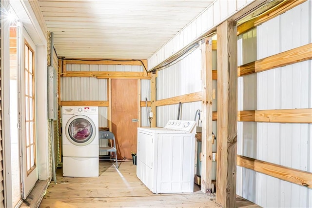 washroom featuring washer / dryer and light wood-type flooring