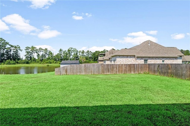 view of yard with a water view