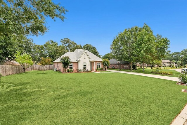 view of front of home with a front lawn