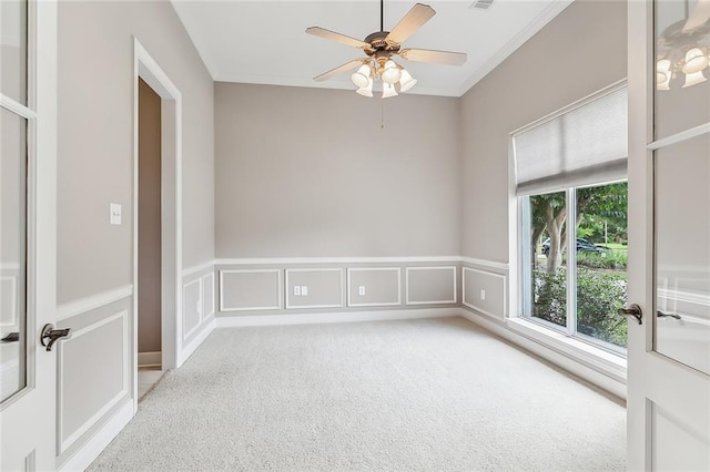 carpeted empty room with ceiling fan