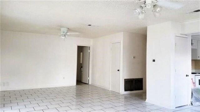 interior space with ceiling fan and hardwood / wood-style flooring