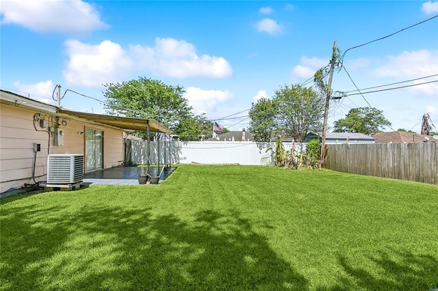 503 Wright Ave, Terrytown, LA 70056 - view of yard featuring a fenced backyard and central air condition unit