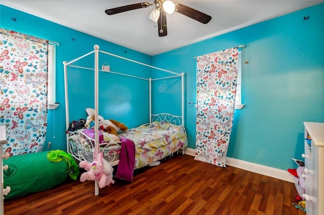 bedroom featuring ceiling fan and wood-type flooring