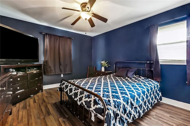 bedroom featuring ceiling fan and hardwood / wood-style flooring