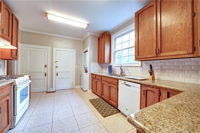 kitchen with ornamental molding, decorative backsplash, light stone countertops, white appliances, and light tile patterned floors