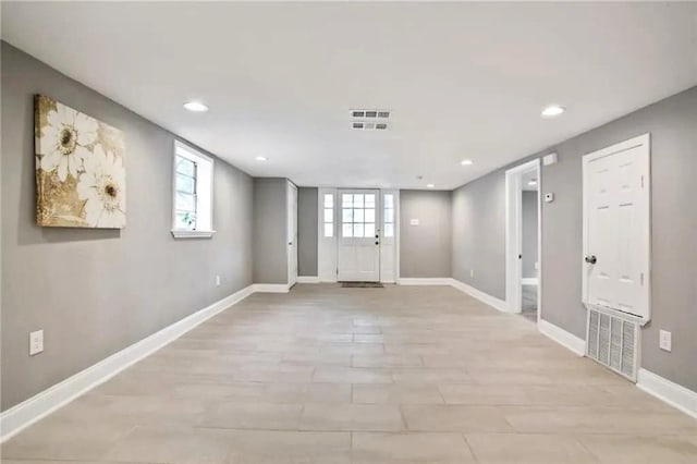 1831 S Dupre St, New Orleans, LA 70125 - below grade area with recessed lighting, visible vents, and baseboards