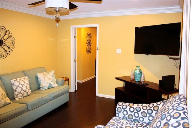 living room featuring ceiling fan, dark hardwood / wood-style flooring, and ornamental molding