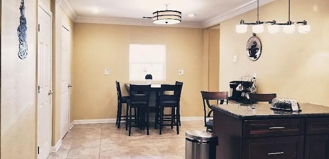1831 N Miro St, New Orleans, LA 70119 - dining room featuring light tile patterned floors, baseboards, and crown molding