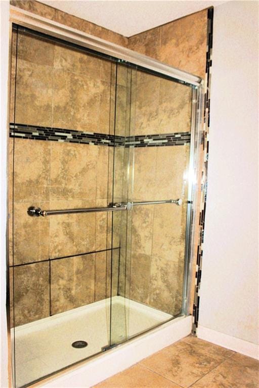 1831 N Miro St, New Orleans, LA 70119 - full bathroom featuring baseboards and a shower stall