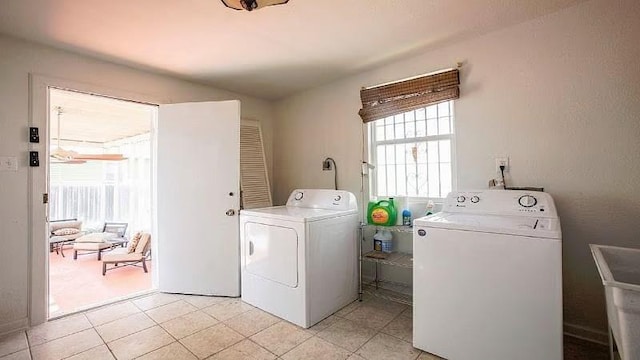1831 N Miro St, New Orleans, LA 70119 - clothes washing area featuring separate washer and dryer, laundry area, a sink, and a healthy amount of sunlight