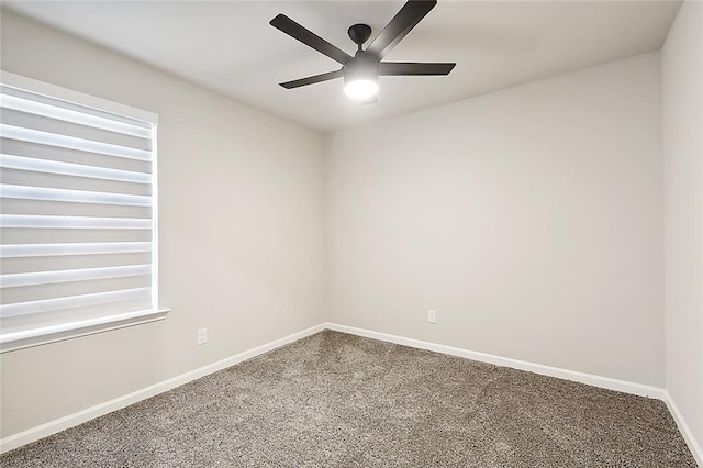 unfurnished room featuring plenty of natural light, carpet, baseboards, and ceiling fan