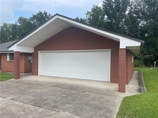 garage with a yard