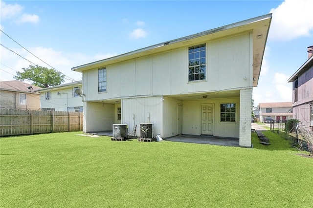 3 Shepard Ct, New Orleans, LA 70114 - back of house featuring fence, central AC unit, and a lawn