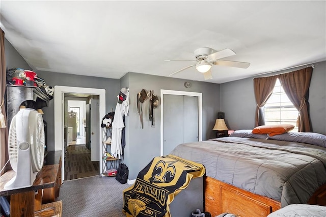 bedroom featuring ceiling fan, carpet flooring, and a closet